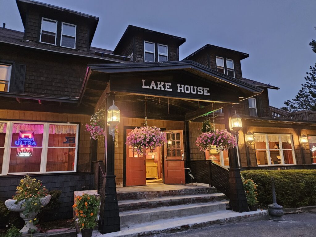 The front of a lake house building